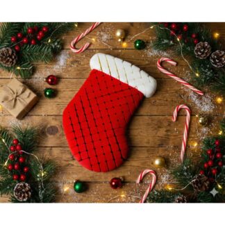 Red articulated Christmas stocking with a white cuff in a festive display