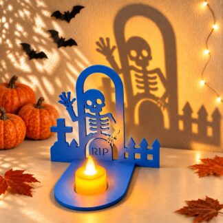 Graveyard shadow decoration with a waving skeleton, tombstone, cross and fence