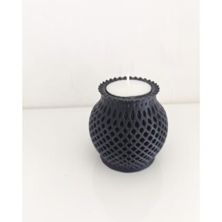 Rounded candle holder with intricate lattice openings and a detailed rim