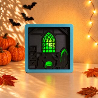 Layered Witches Lamp featuring witches around a cauldron inside a Gothic cottage